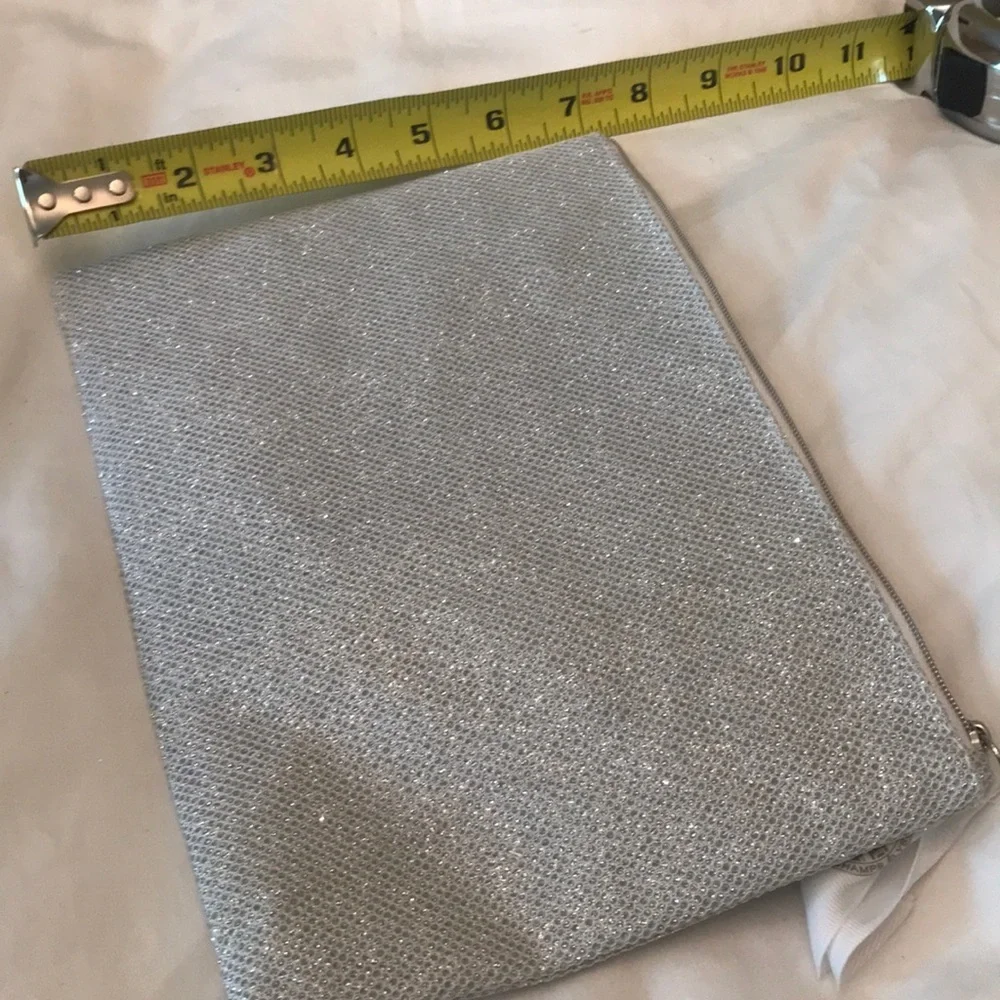 NWOT Orlane Paris silver sparkly cosmetic pouch